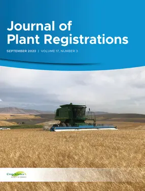 Cover of Journal of Plant Registrations. A combine harvesting a field of Successor barley in Oregon. 